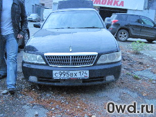 Битый автомобиль Nissan Laurel